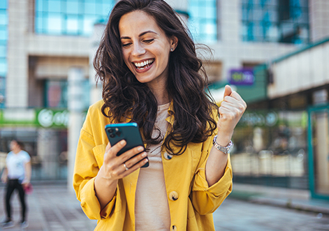 woman looking at smart phone